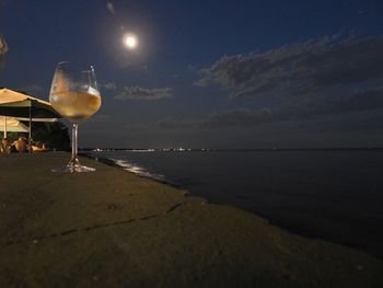 Scenic view of sea against sky at night