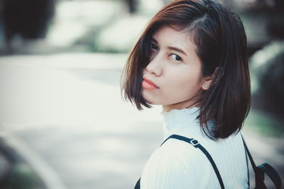 Close-up portrait of young woman