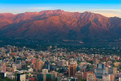 Panoramic view of providencia district with los andes mountain range in santiago de chile