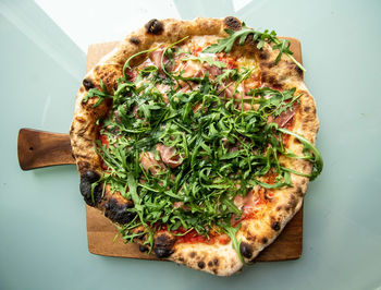 High angle view of pizza in plate on table