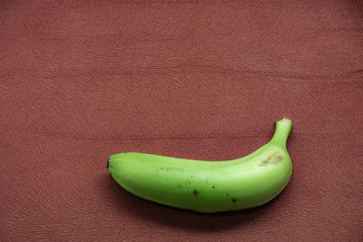 Directly above shot of green fruit on table