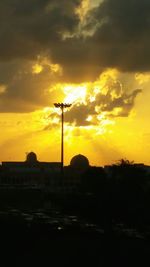 Scenic view of landscape against sky at sunset