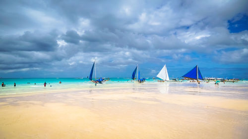 Scenic view of beach against sky