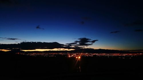 Illuminated cityscape at night