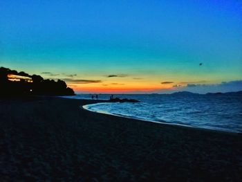 Scenic view of sea against sky at sunset