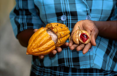 Close-up of man holding ice cream