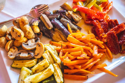 Close-up of chopped vegetables on plate