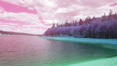 Scenic view of sea against cloudy sky