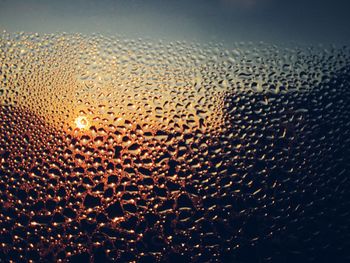 Full frame shot of water at sunset