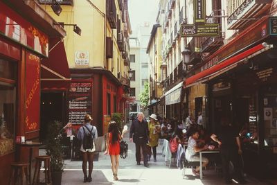 People walking on city street