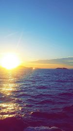 Scenic view of sea against sky at sunset