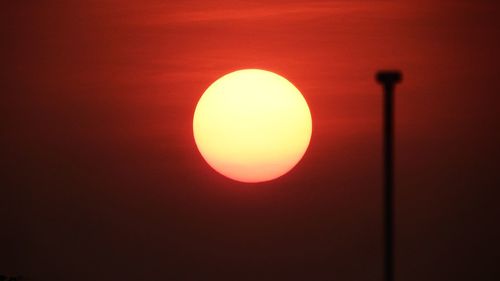 Close-up of illuminated sun during sunset