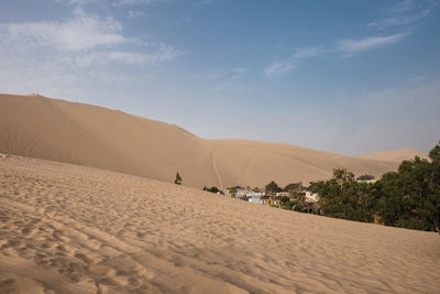 Scenic view of desert against sky