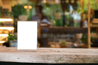 Close-up of paper on table