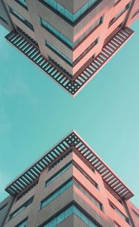 Low angle view of modern building against clear sky