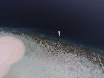 High angle view of waves on beach