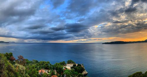 Scenic view of sea against sky at sunset