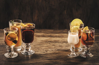 Close-up of wine glasses on table