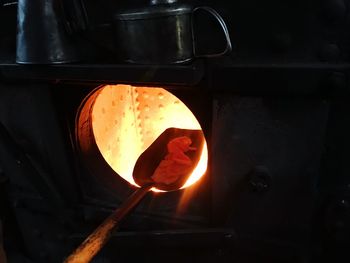 Close-up of orange food on metal