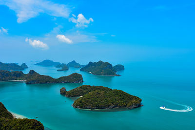 Panoramic view of bay against blue sky