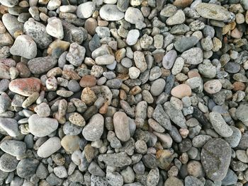 Full frame shot of pebbles at beach