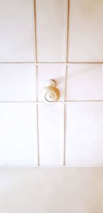 Close-up of white door