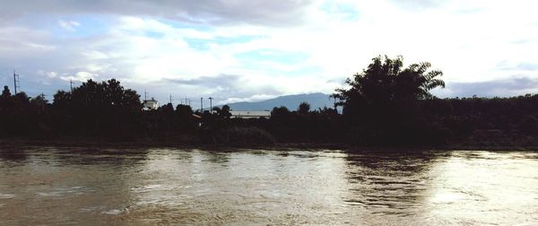 Scenic view of river against sky