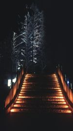 View of illuminated street at night