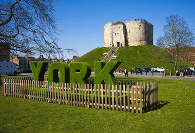 York castle with fenced in lettering in foreground