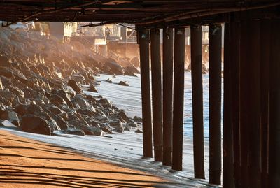 Pier at beach in city