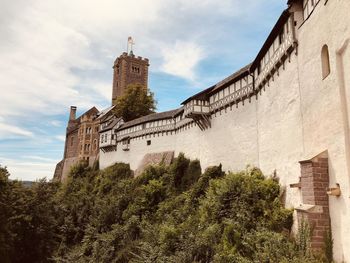 Low angle view of historic building against sky, wartburg germany