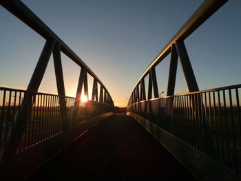 View of suspension bridge at sunset