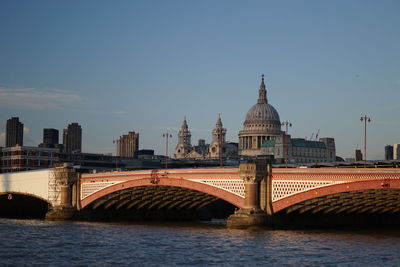 Bridge over river against sky