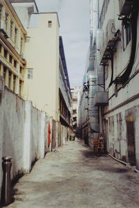 Narrow street amidst buildings in town