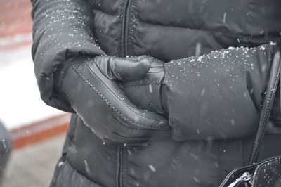 Close-up of hand holding ice cream