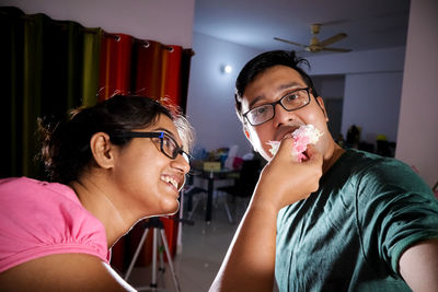 Portrait of happy young couple