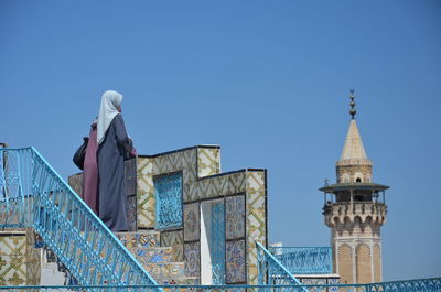 Low angle view of building against blue sky