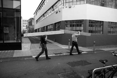 Men on road in city