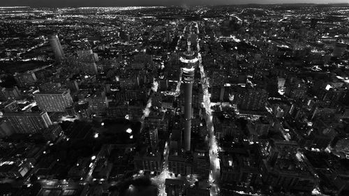 Aerial view of illuminated cityscape at night