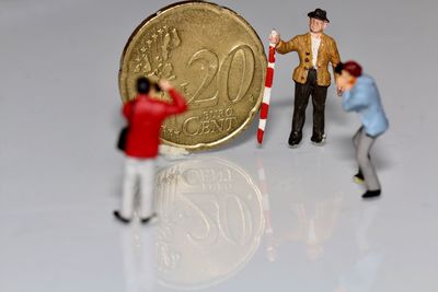 Close-up of figurine against black background