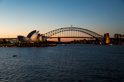 View of bridge over river in city