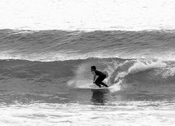 Man surfing in sea