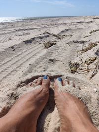 Low section of man on beach