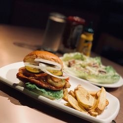 Close-up of burger in plate on table