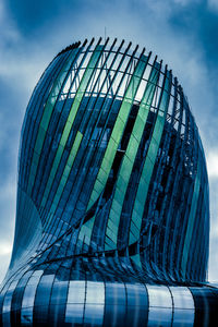 Low angle view of modern building against sky