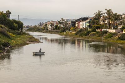 Scenic view of river against sky