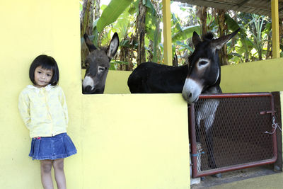 Portrait of girl standing outdoors