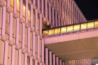 Low angle view of illuminated building at night