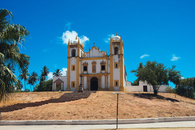 View of historic building against blue sky