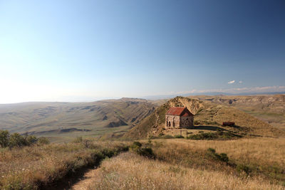Scenic view of land against sky